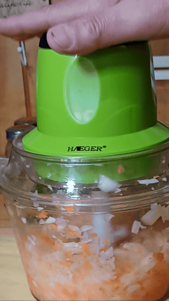 máquina picadora de verduras con botón de encendido seguro